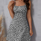 The cami dress with small flower prints a backless design and thin spaghetti straps is suitable for beach vacations and summer