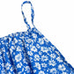 The cami dress with small flower prints a backless design and thin spaghetti straps is suitable for beach vacations and summer