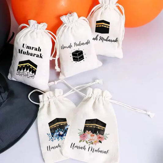Set of five Kaaba-themed Umrah Mubarak gift bags for Islamic celebrations