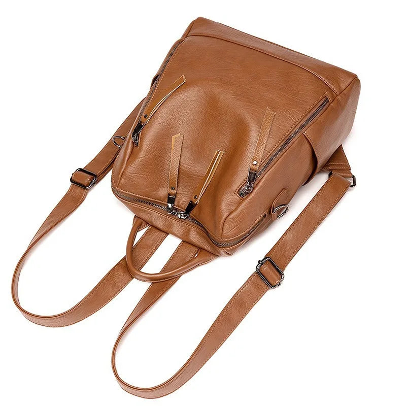 Women's Lightweight Leather Backpack Spring 2026 Commuter Bag Urban Minimalist Style Synthetic Leather Floral Embossed
